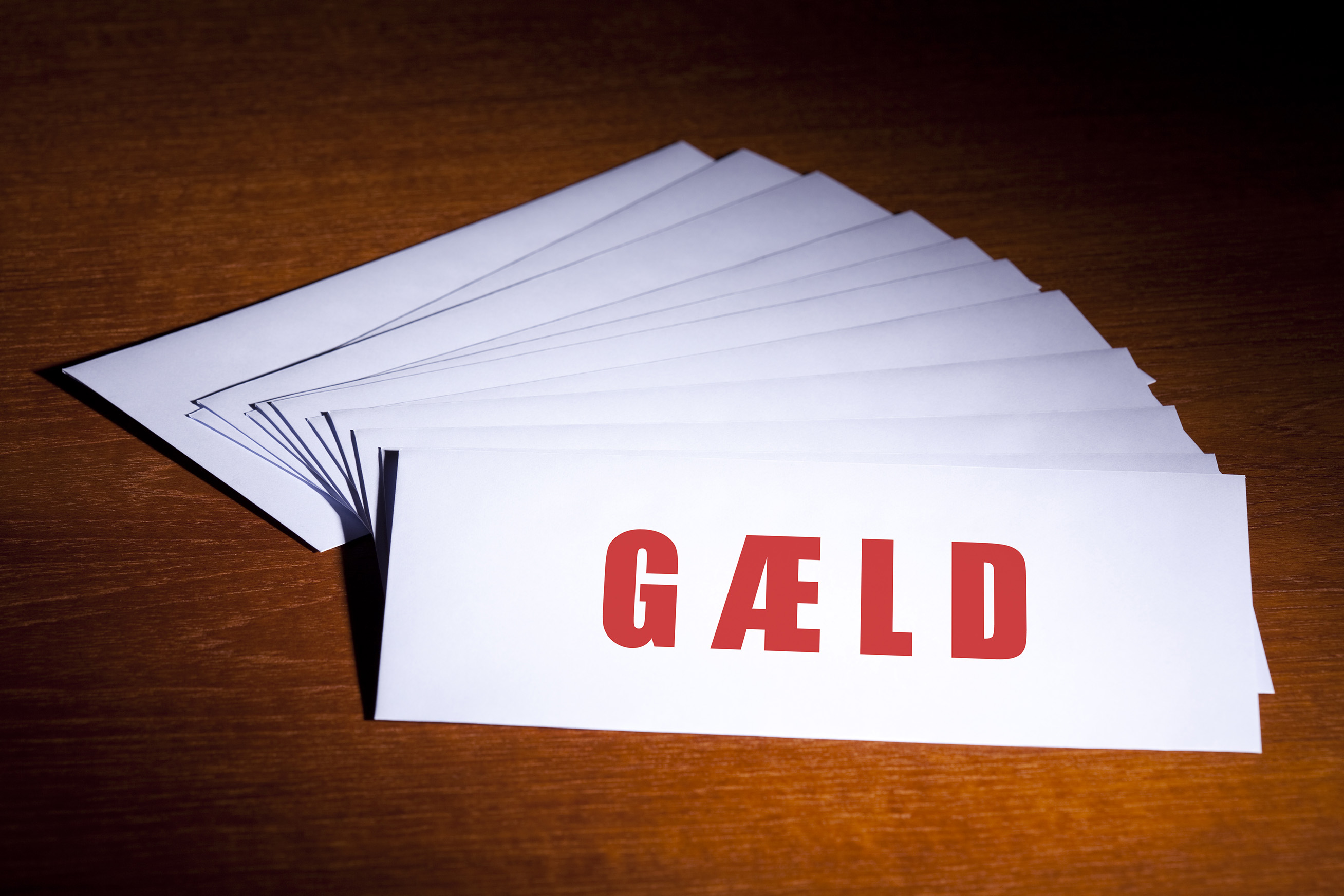 Skilt med teksten Gæld