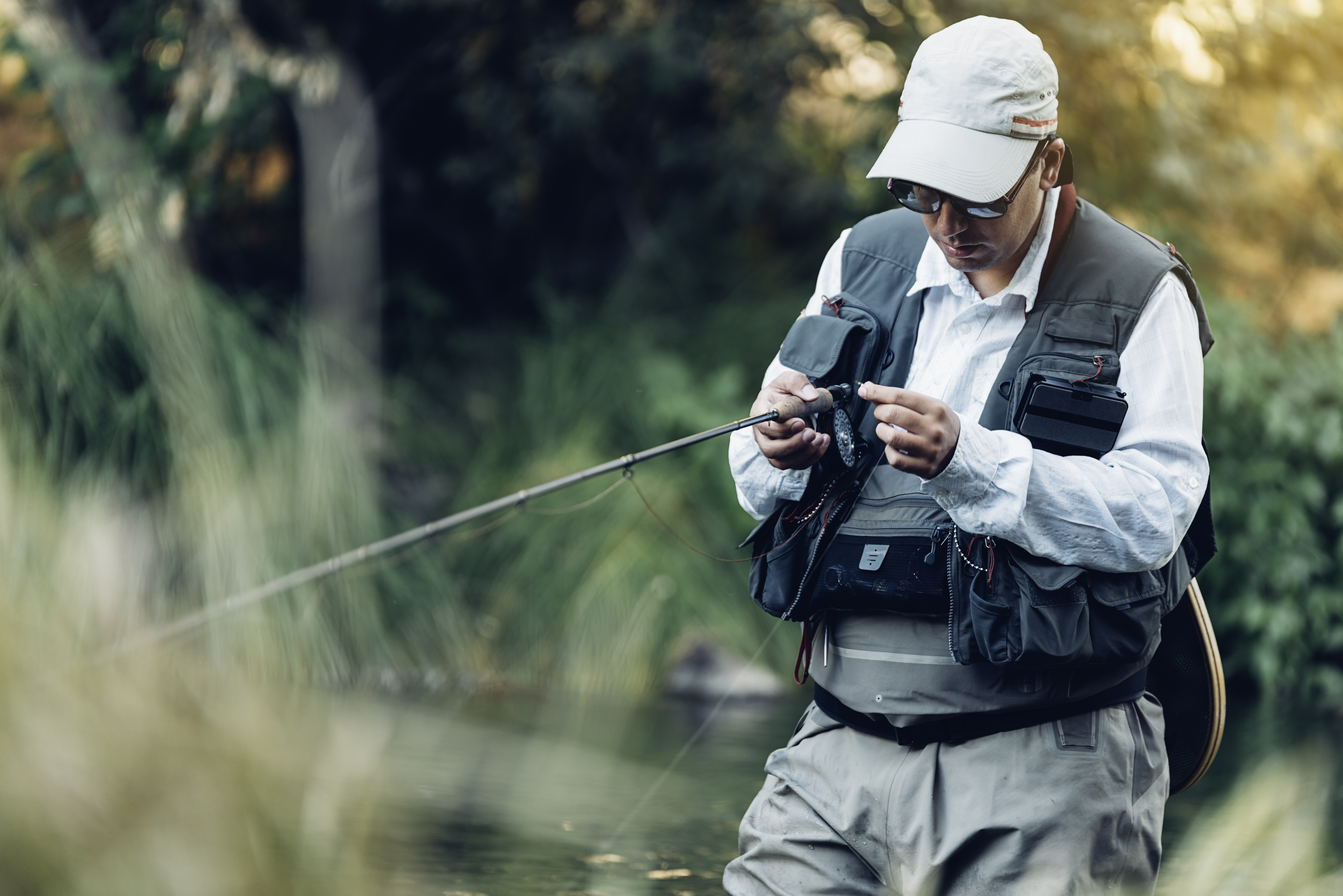 Fisker med fiskestang